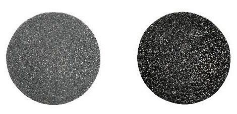 Zwei schwarze Kreise mit unterschiedlichen glitzernden, funkelnden Oberflächen. Ein heller, eines dunkler, beide glänzend.