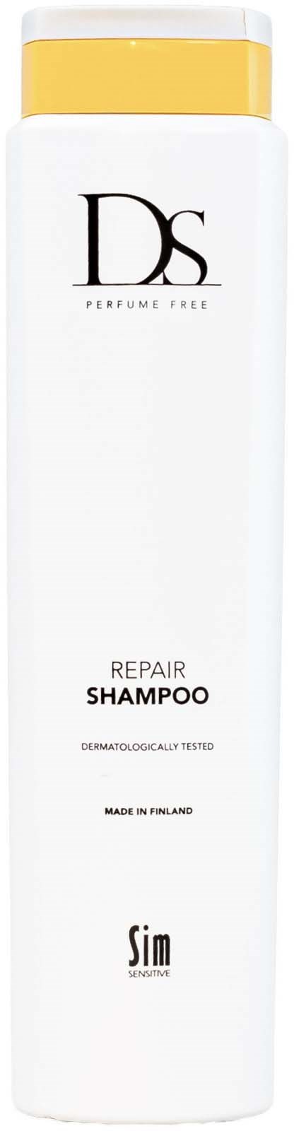 A white shampoo bottle with a yellow cap, labeled DS and Repair Shampoo, made in Finland.