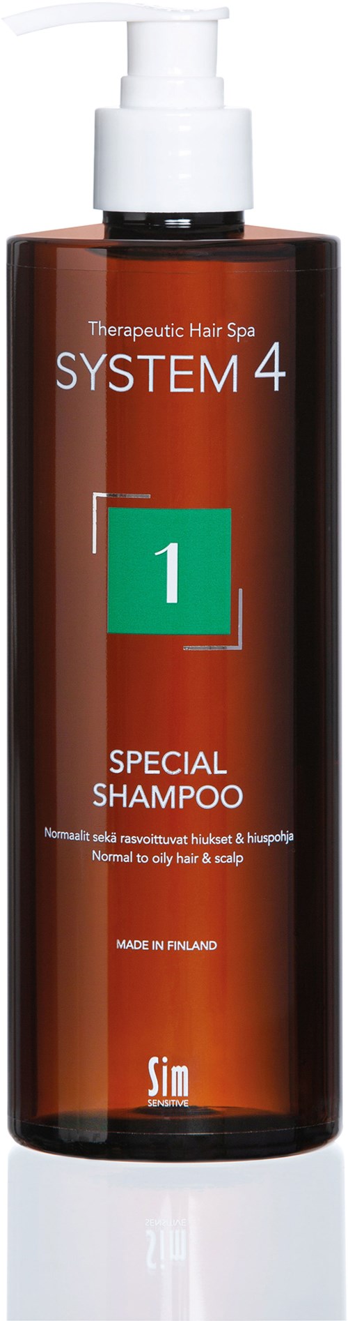 Eine braune Flasche mit weißem Pumpkopf, labeled 'System 4 Special Shampoo' für Haarbehandlung, hergestellt in Finnland.