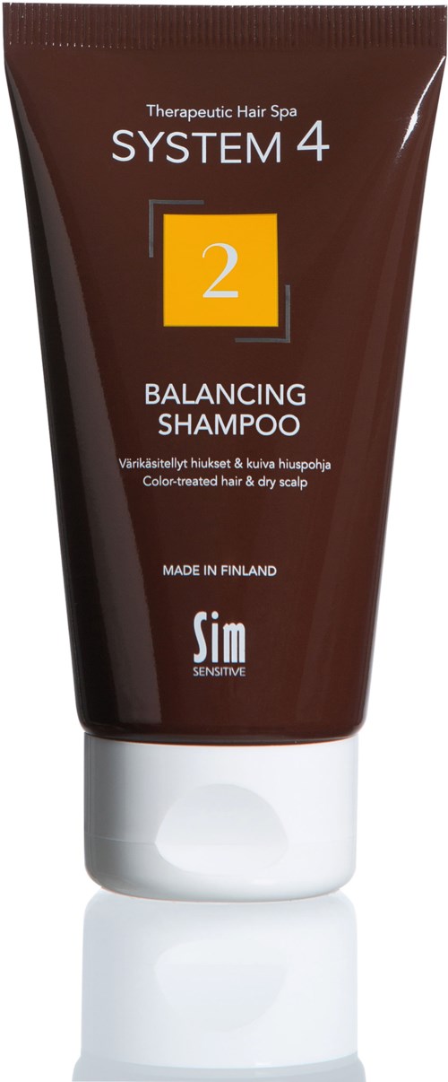 A brown tube of balancing shampoo with a white cap, labeled 'System 4' and '2' for hair care.