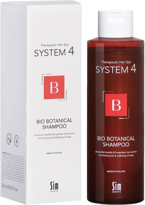 Eine rote Flasche Bio Botanical Shampoo neben einer weißen Box mit schwarzem und rotem Text, beschriftet "SYSTEM 4".