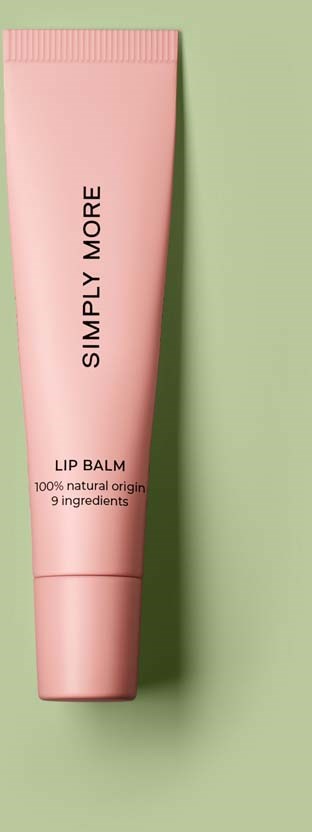 Pink tube labelled 'Simply More' lip balm with 9 ingredients, on a split green and black background.