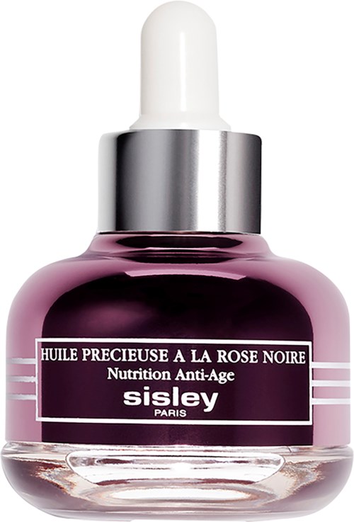 Kleine roze glazen fles met druppelaar en zwarte dop, gelabeld als anti-aging gezichsolie met rose noir geur.