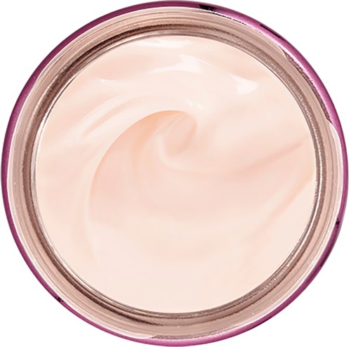 En rund behållare med ljus rosa kräm inuti, kanske en kosmetisk produkt som dagkräm eller foundation.