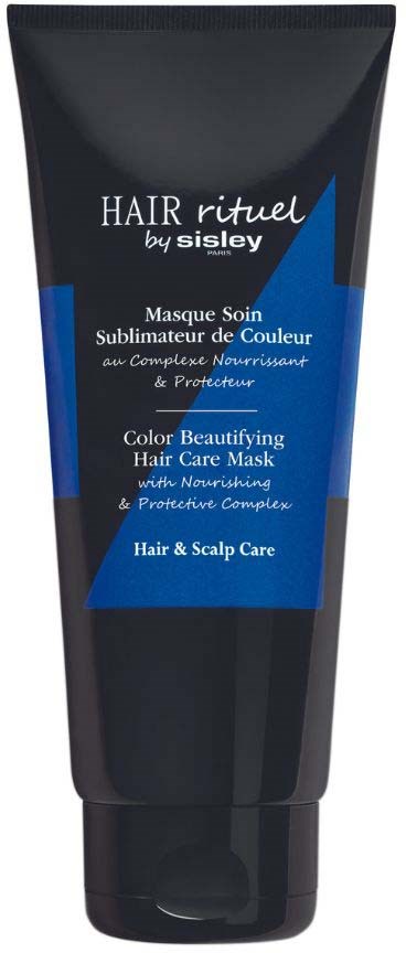 Eine schwarze Tube mit blauer und weißer Beschriftung für eine Haarpflege-Maske von Sisley, Fokus auf Haar- und Kopfhautgesundheit.