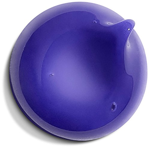 A blue bowl with a small spout, empty and with a shadow on the side.