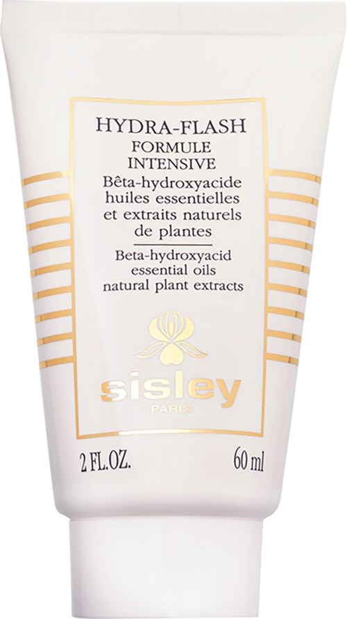 A white tube with gold and black text, labeled Sisley Hydra-Flash, contains skincare product with natural plant extracts.