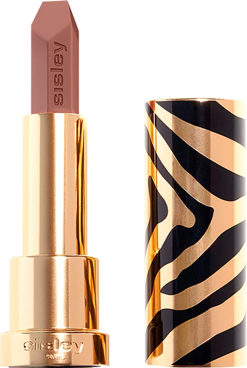 A beige lipstick with a gold and black zebra-striped case.