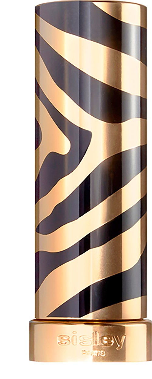 A tall, cylindrical object with a gold and black zebra stripe pattern and a gold-colored base.