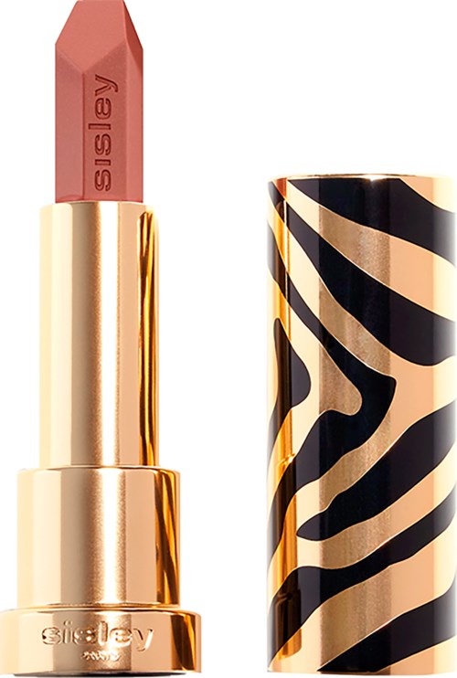 A lipstick in a gold tube with a zebra stripe design cap. The lipstick is pinkish-brown and branded.