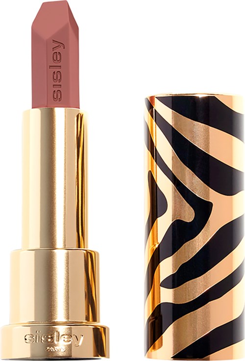 A lipstick with a pinkish-brown color in a shiny gold and black zebra-patterned case.