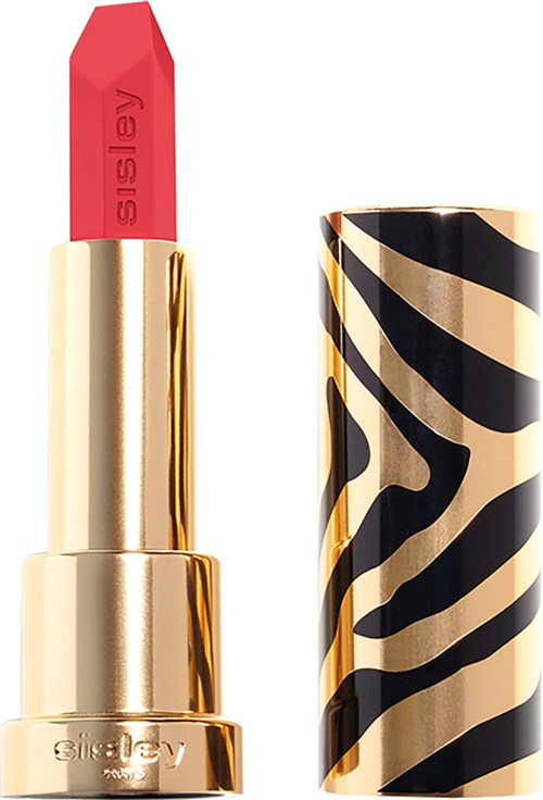 Goud en zwart zebra-geverfde lippenstiftverpakking met roze lippenstift erin.