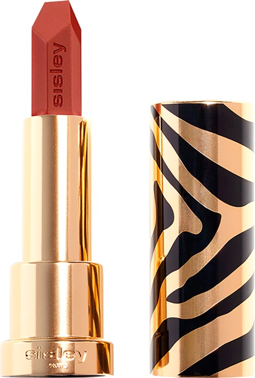 A red lipstick in a gold case with a zebra pattern cap.