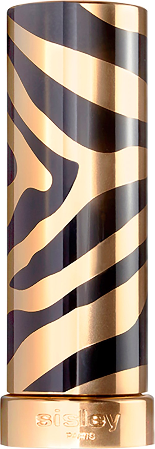 A tall cylindrical object with black and gold zebra stripe pattern and a gold band at the bottom.