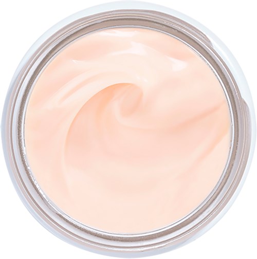 En krukke med rosa, kremet lotion eller fuktighetskrem inni. Krukken er åpen, og viser den glatte substansen.