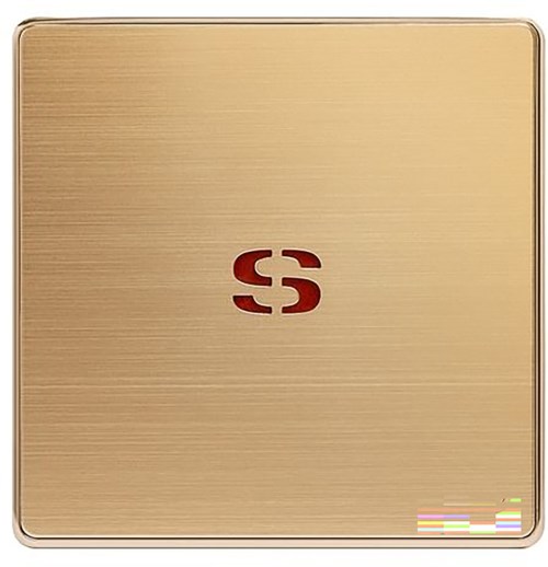A gold-colored square box with a red logo in the center.
