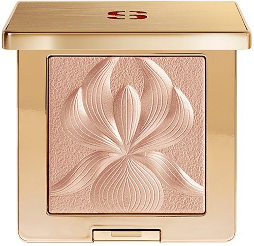 A blush with a floral design embossed in the center, inside a gold square case with a lid.