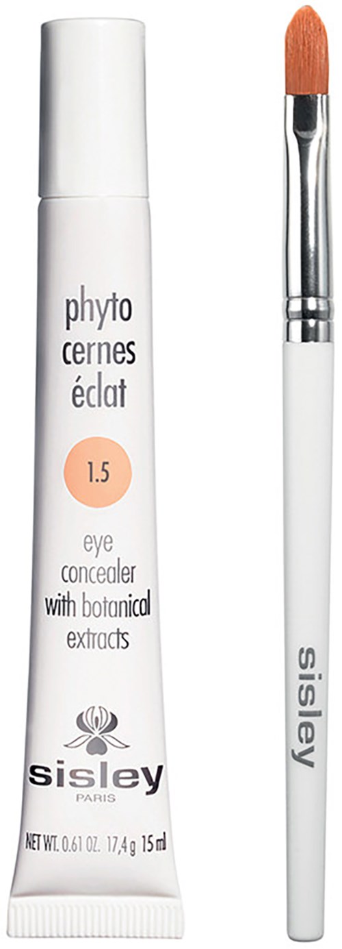 A white tube of eye concealer with orange circle, and a white brush with a pointed tip.