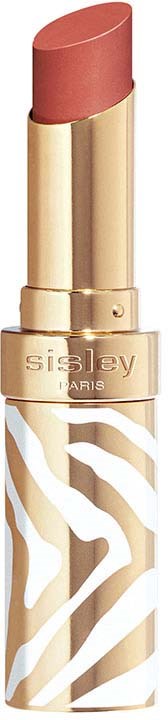 A pinkish lipstick in a gold and white zebra-patterned case.