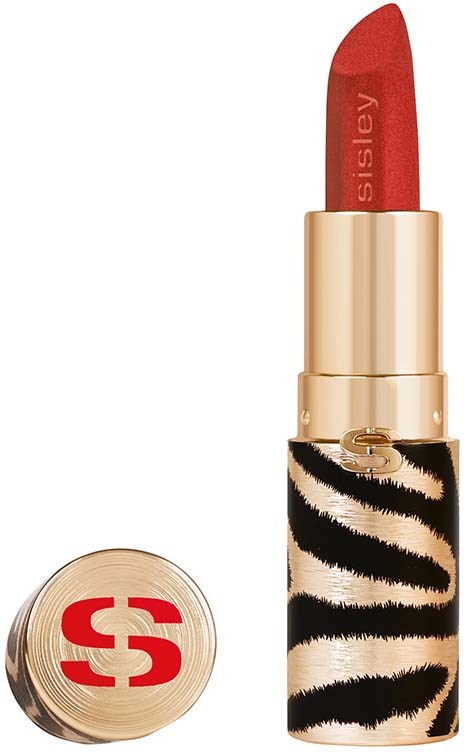 A lipstick in a black and white zebra pattern case with red lipstick showing. The brand 'Sisley' is on the lipstick.