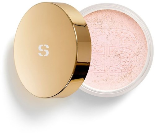En rund behållare med rosa puder och ett guldlock med vit logga.