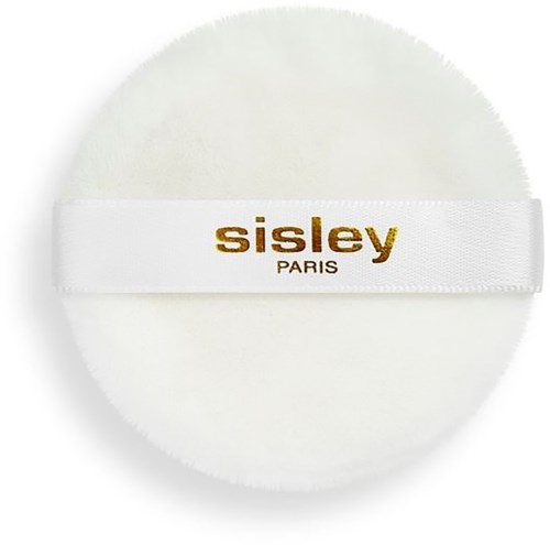 En rund vit sminksvamp med en band som säger sisley PARIS i guldbokstäver.