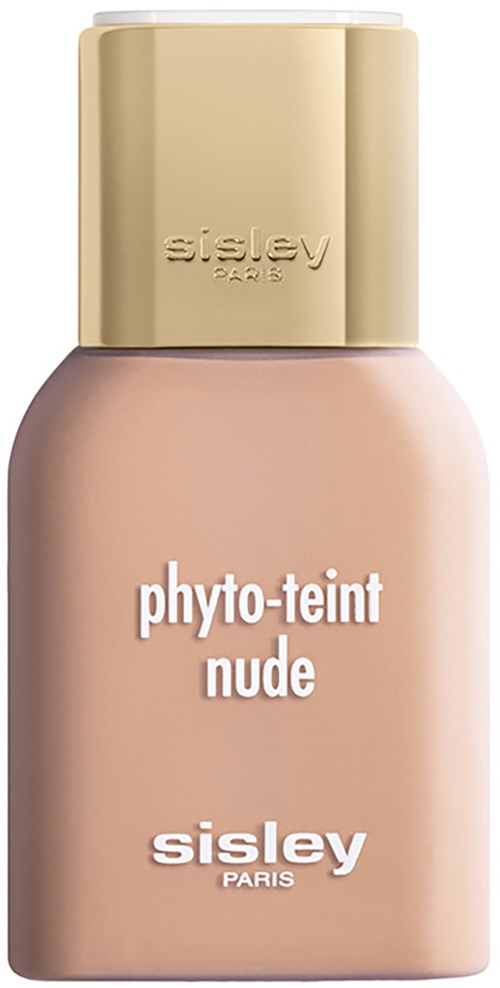 En beige och rosa flaska av Sisley hudfoundation märkt 'phyto-teint nude' med ett guldlock.