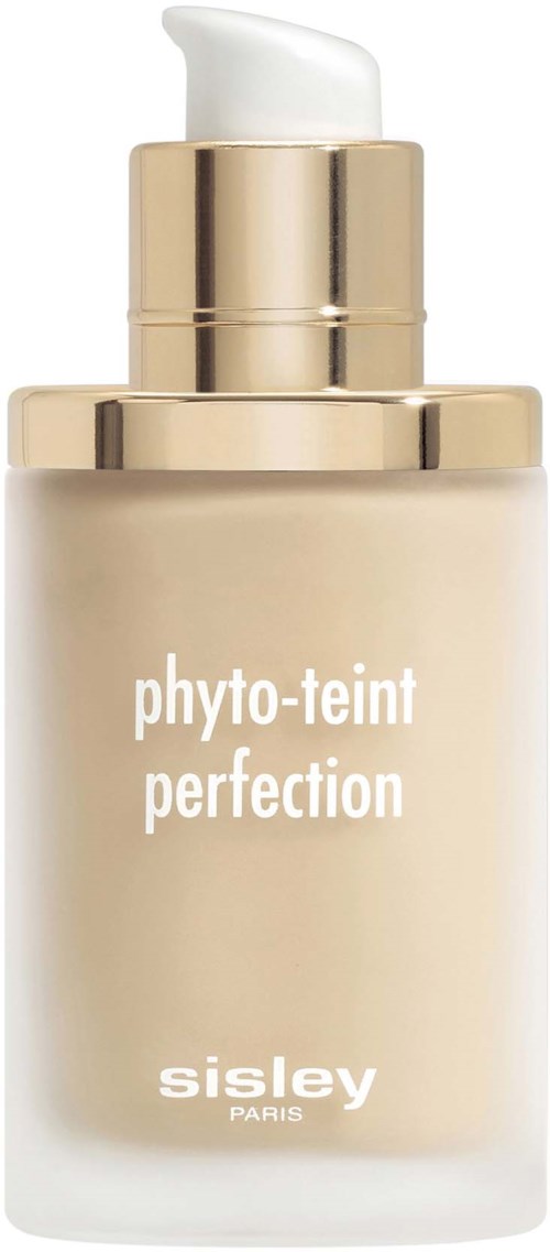 Valkoinen pumpullinen voidepullo, kullankeltainen korkki, ja etiketti 'phyto-teint perfection' Sisleyltä.