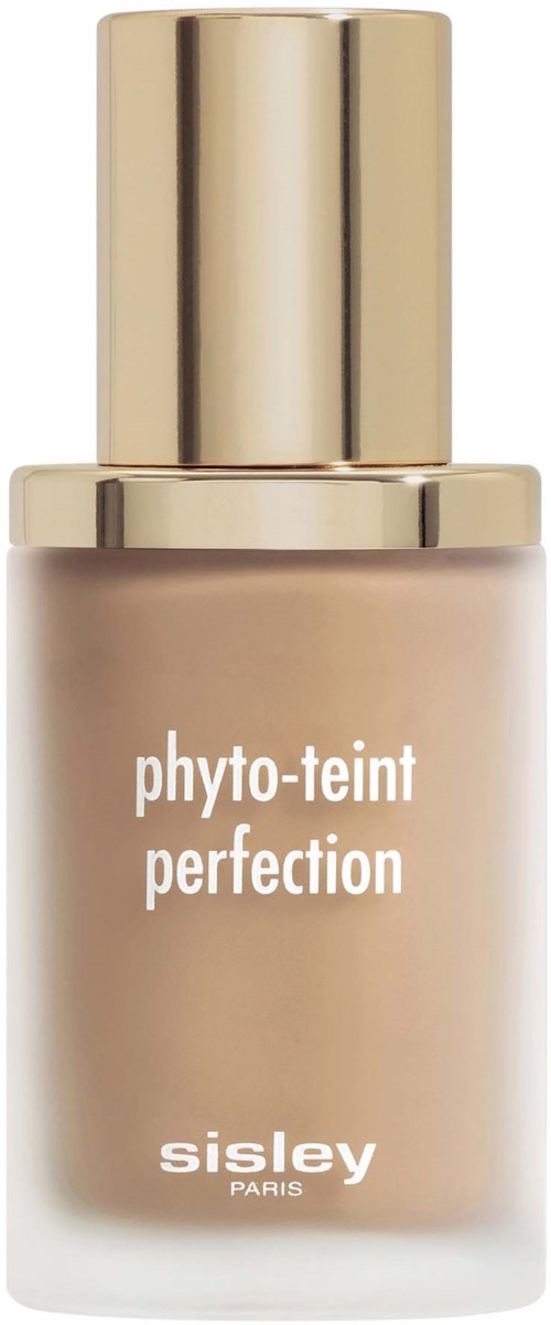 Beige pullo, jonka päällä on kultainen korkki ja lukee 'phyto-teint perfection' Sisley Parisilta, meikkiin tai ihonhoitoon.