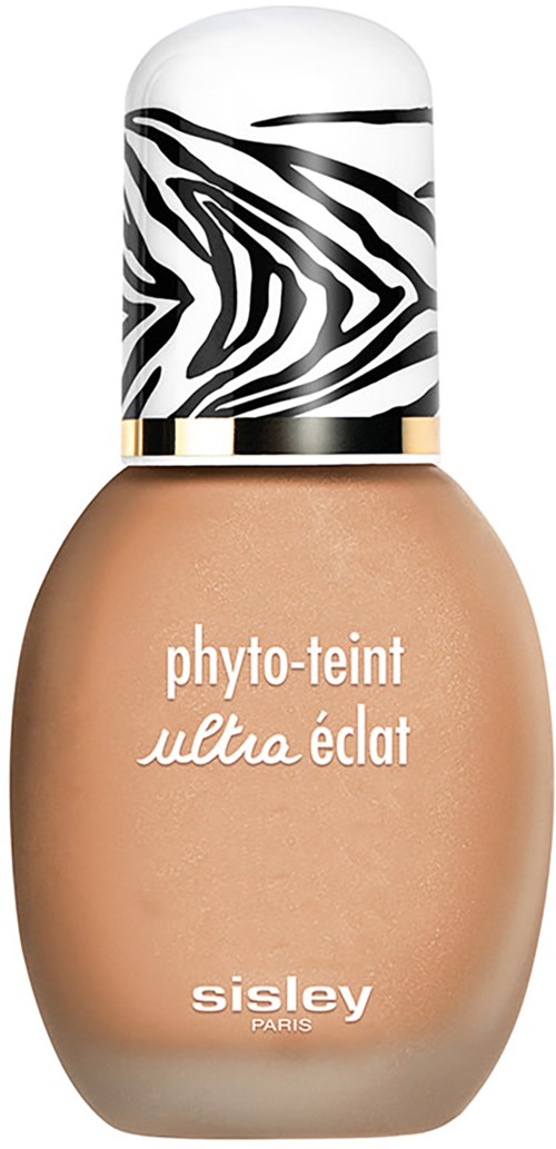 T-buteloa sisältävä pullo, jossa on zebramäinen kansi, merkinnällä 'phyto-teint ultra éclat' ja Sisley Paris.