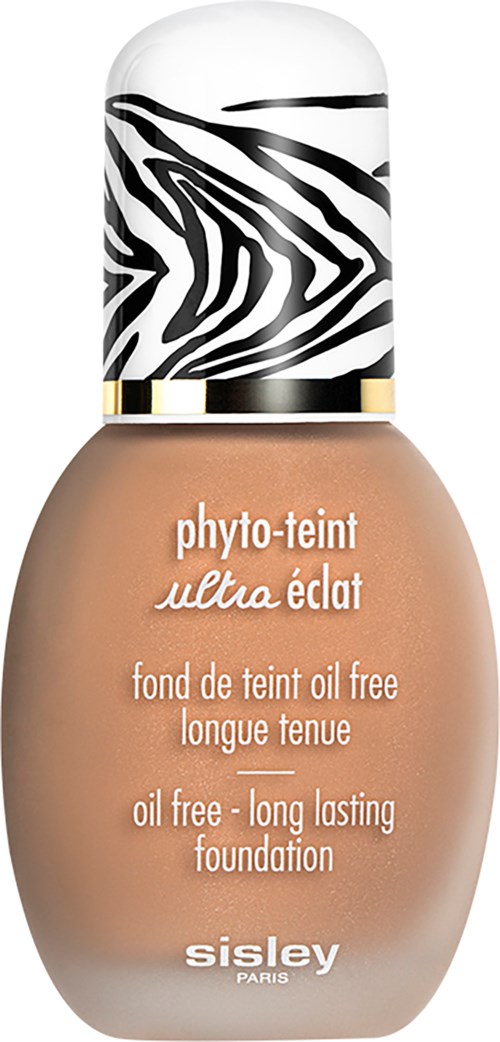 Pullo pitkäkestoista öljytöntä meikkipohjaa, jossa on zebra-kuvioitu kansi ja beige neste.