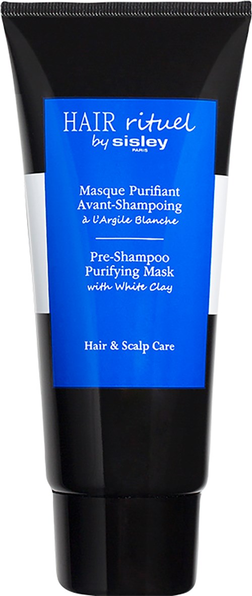 Een zwarte tube met een blauw label die zegt dat het een pre-shampoo zuiverende masker voor haar en hoofdhuidverzorging is.