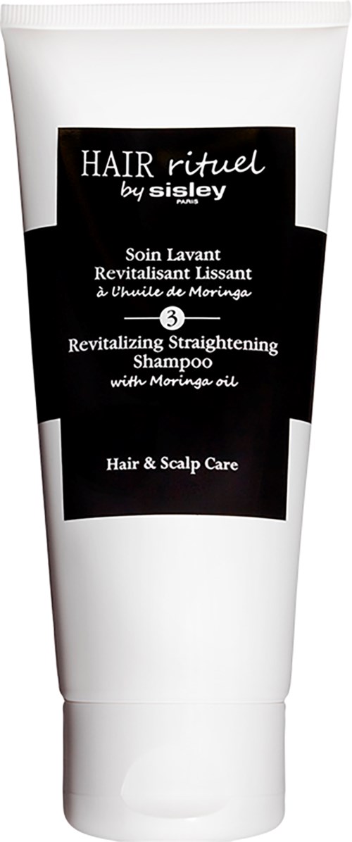 Een witte tube shampoo met 'Hair Rituel by Sisley' label met zwarte en witte tekst en een zwart etiket.