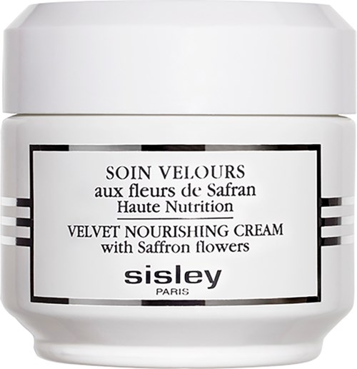 Valkoinen Sisley Velvet Nourishing Cream -purkki, sisältää sahramin kukkia, ihonhoitoon, merkinnät ranskaksi ja englanniksi.