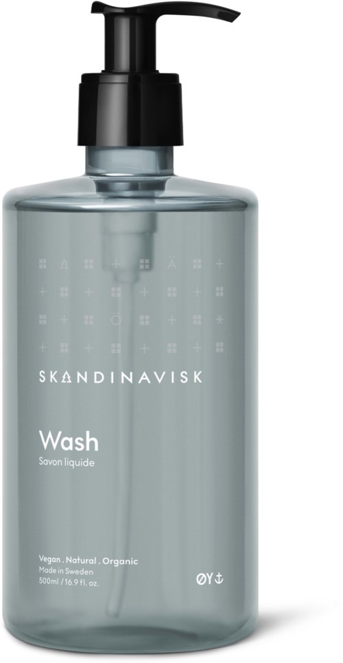 Eine graue Flasche mit schwarzem Pumpkopf, beschriftet 'Skandinavisk Wash' für Flüssigseife.