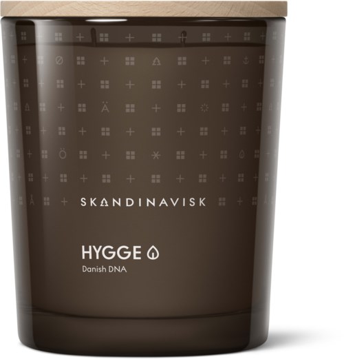 Een zwart container met Scandinavische branding, gelabeld 'HYGGE Danish DNA', waarschijnlijk voor een huidverzorgings- of schoonheidsproduct.