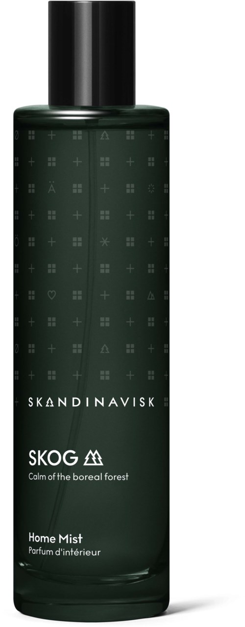 Eine lange, dunkelgrüne Flasche mit 'SKANDINAVISK SKOG' Beschriftung und schwarzem Deckel, für den Innenbereich.