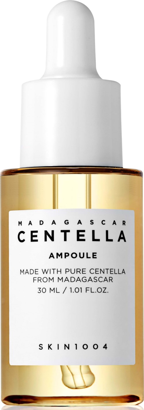 A clear bottle with a white dropper cap containing Madagascar Centella ampoule for skincare.