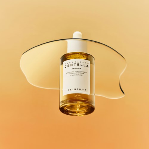 A bottle of skincare serum with a dropper, surrounded by an abstract, organic shape on a light background.