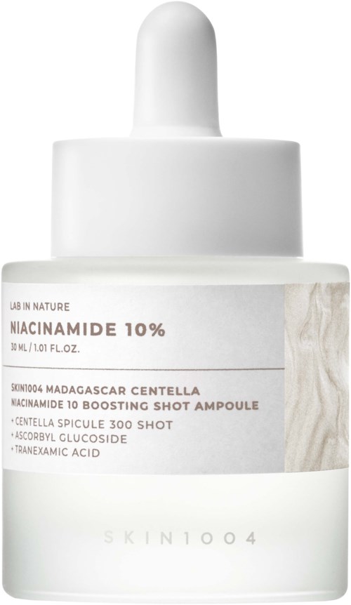A white skincare bottle with a dropper cap, labeled Niacinamide 10% by Skin00a4, featuring product details and ingredients.