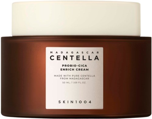 Ein brauner Behälter mit weißem Deckel, beschriftet Centella Enrich Cream, hergestellt in Madagaskar, 50 ml.