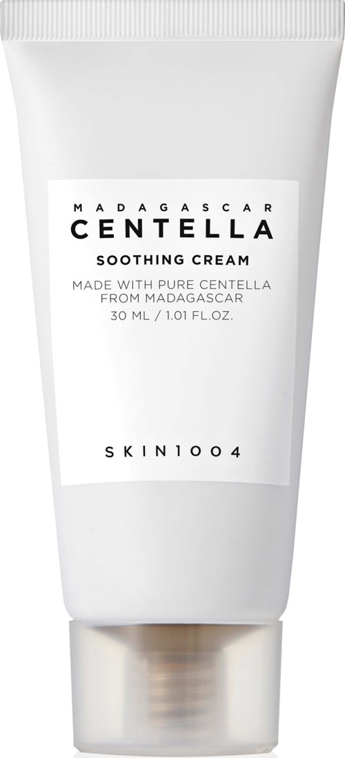 Eine weiße Tube Madagascar Centella Beruhigungscreme mit schwarzem und grauem Text, Marke SKIN1004.
