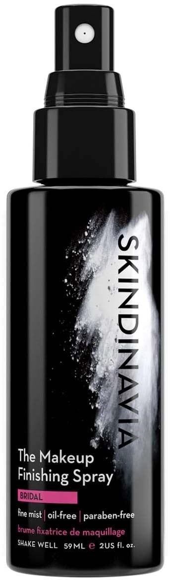Eine schwarze Sprühflasche mit Aufschrift 'The Makeup Finishing Spray' und weißem Spritzendesign, zum Fixieren von Make-up.