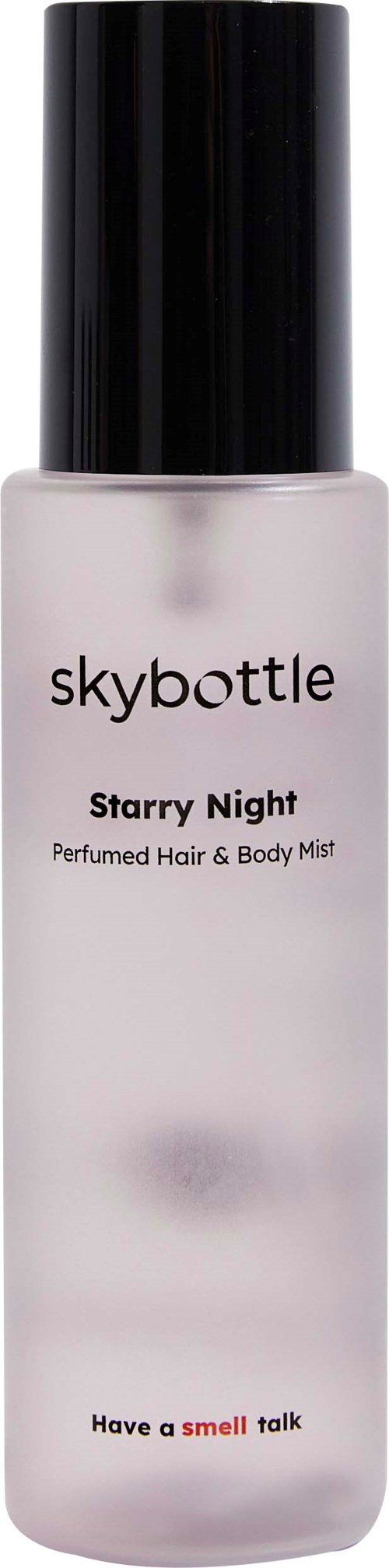 Skybottle Starry Night -sumun sumuterppu, haju hiuksille ja vartalolle, musta korkki, vaalea pullo, yksinkertainen teksti.
