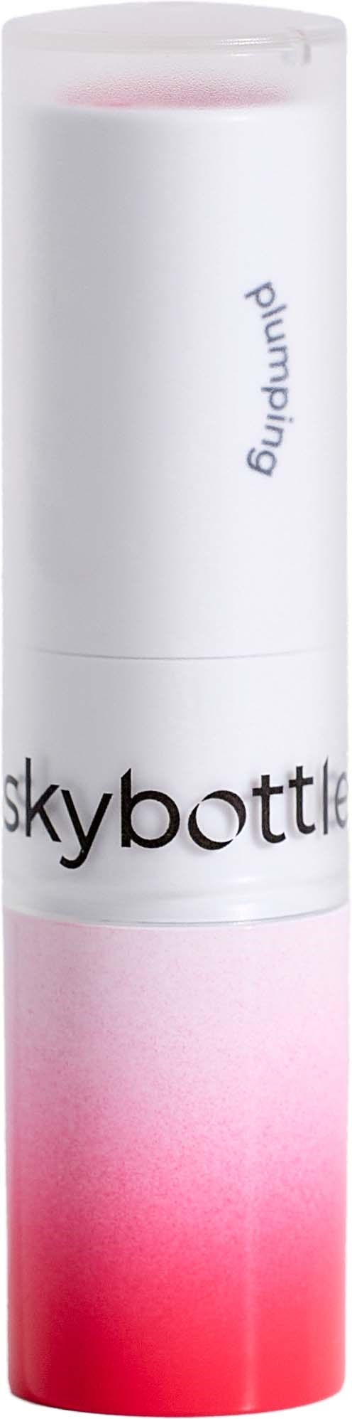 Kiertämäinen ihonhoitotuote, jossa valkoinen korkki ja vaaleanpunainen gradienti, merkinnät 'skybottle' ja 'plumping'.