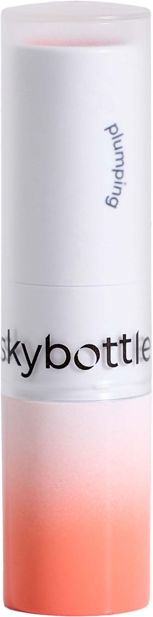 Valkoinen ja vaaleanpunainen sylinterimäinen huulirasva, jossa lukee "skybottle" ja "plumping" pakkauksessa.