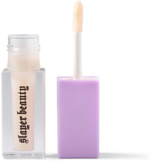 En liten läppglansbehållare med en vit appliceringspinne och ljuslila hölje.