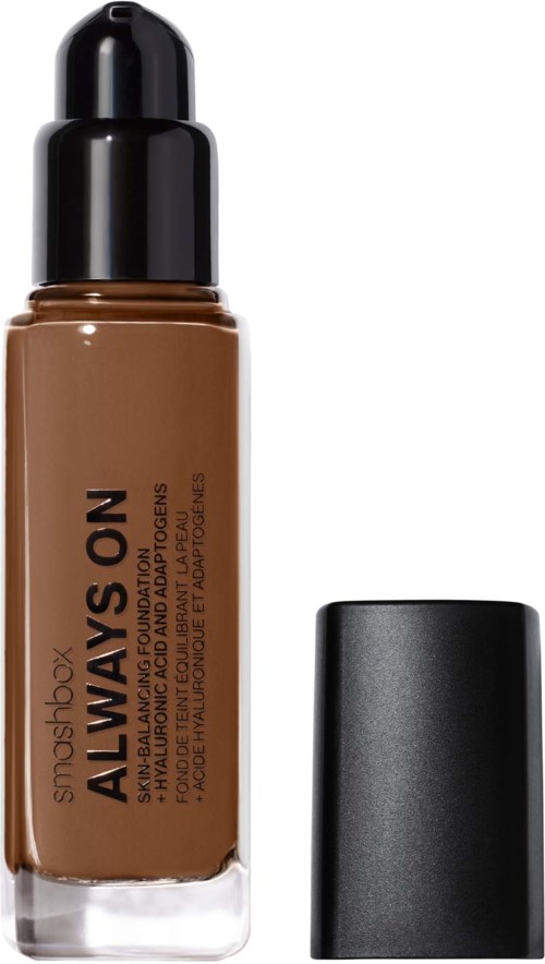 A bottle of Smashbox Always On liquid foundation and its black cap.