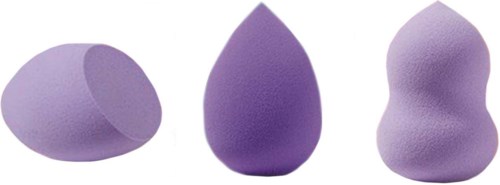 Three purple makeup sponges of different shapes on a white background.