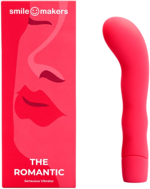 Eine rosa Verpackung mit einem lachenden Gesicht und roten Lippen, neben einem pinken gekrümmten Vibrator. Die Verpackung heißt 'The Romantic'.